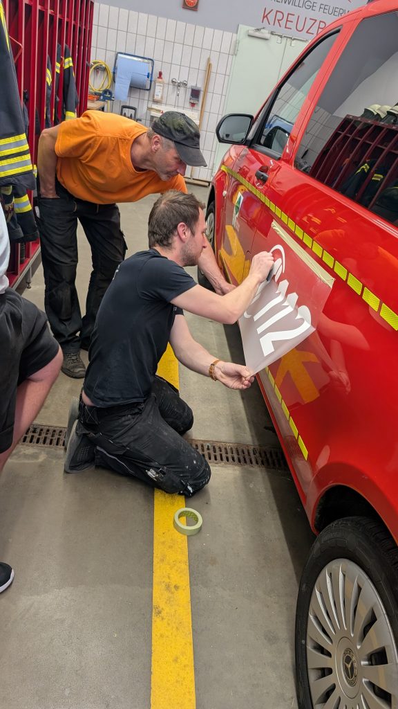 FF Kreuzberg - Beklebung MTW - Seitenansicht - Teamwork